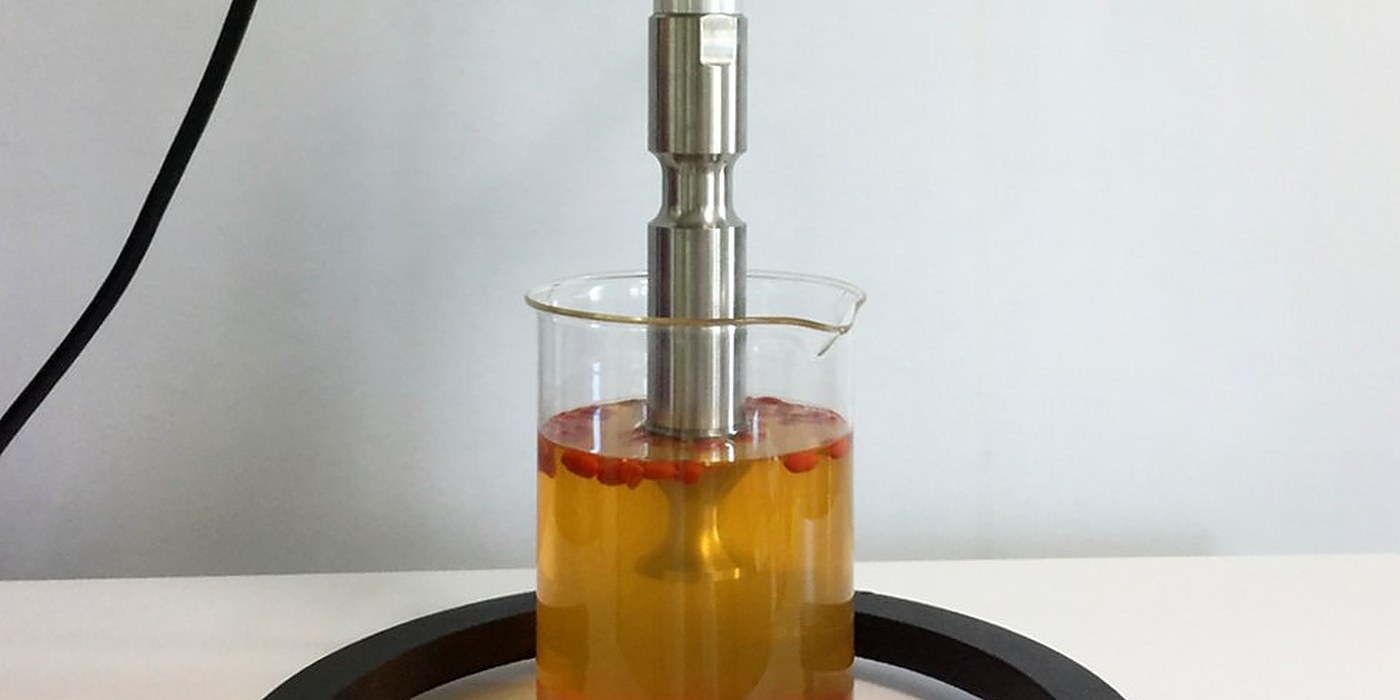 Liquid Processing application &mdash; ultrasonic probe running in a beaker of liquid