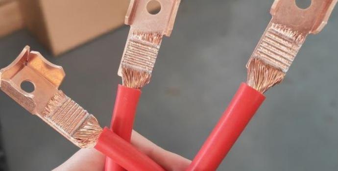 Lug terminals ultrasonically welded onto stranded copper cable