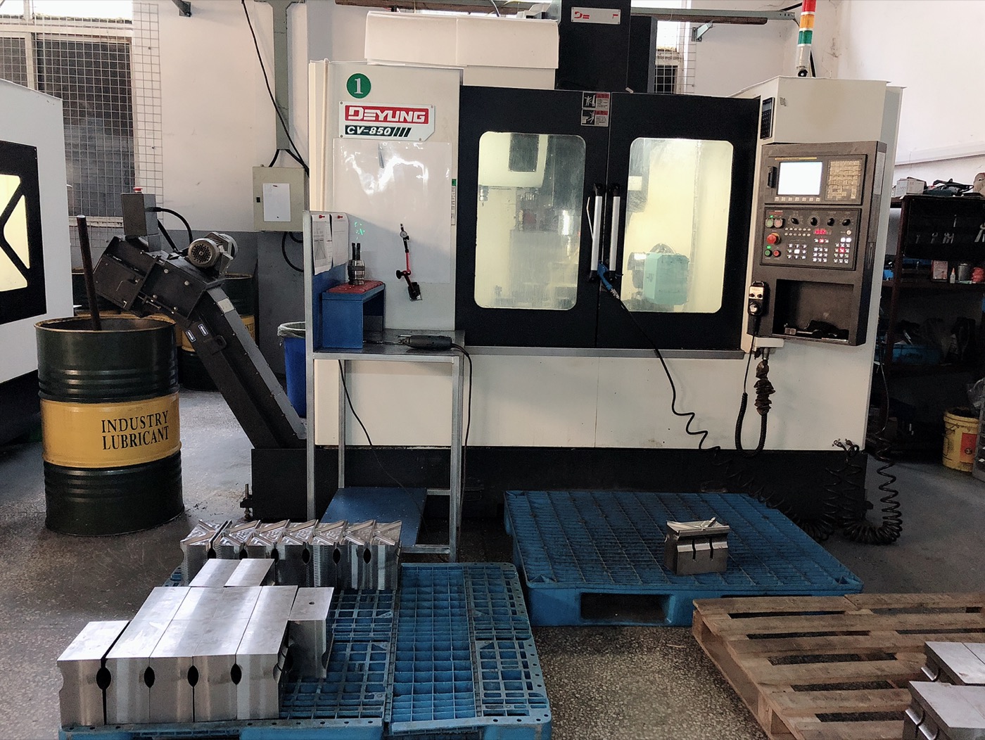 CNC machining centre cutting a custom ultrasonic horn in the INTOP machine shop