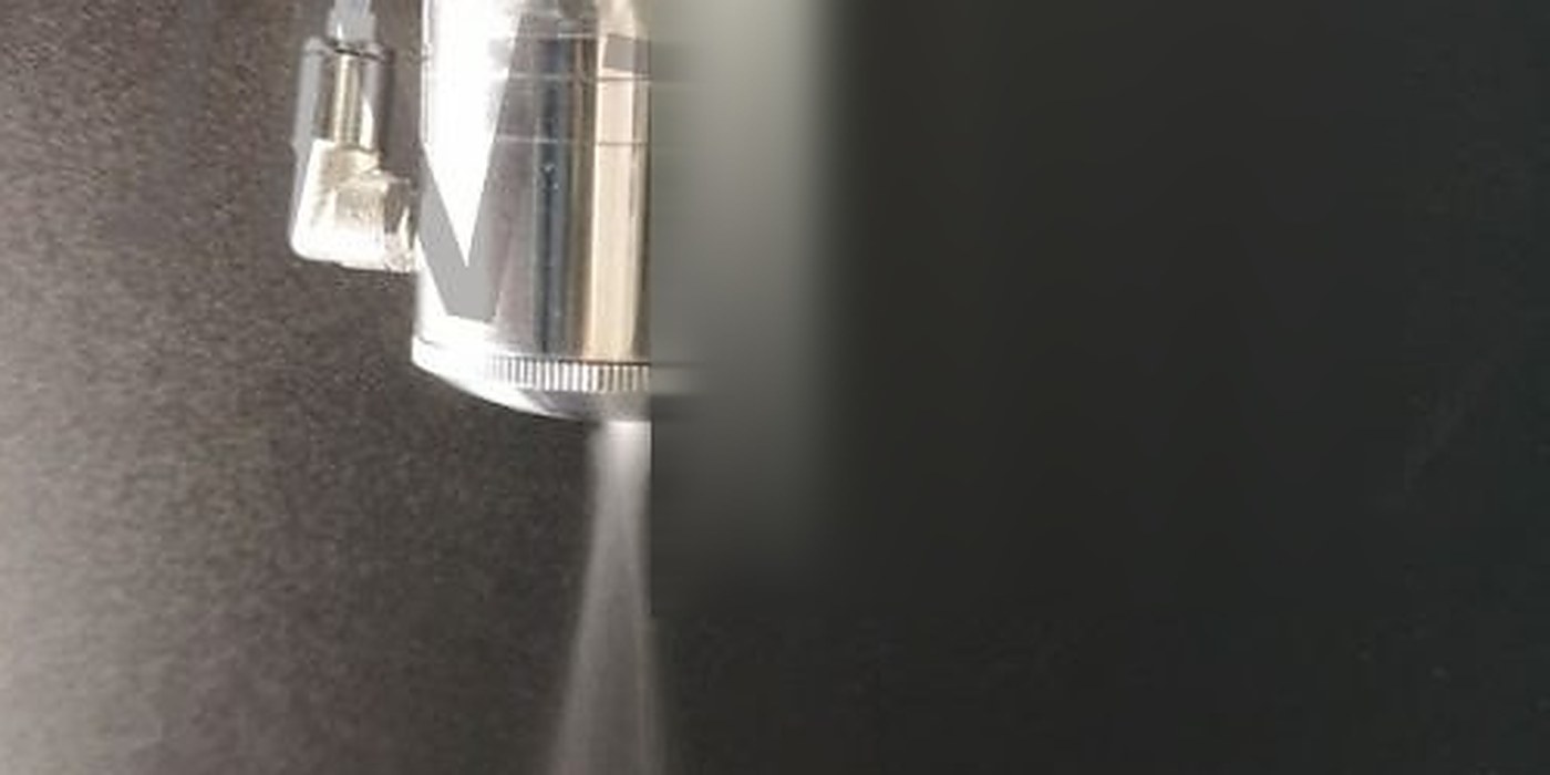 Spray Coating application &mdash; fine mist from a vibrating ultrasonic nozzle