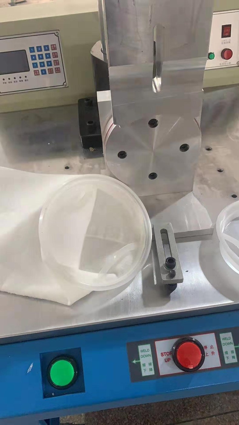 Part held in a part-specific fixture on a turntable station