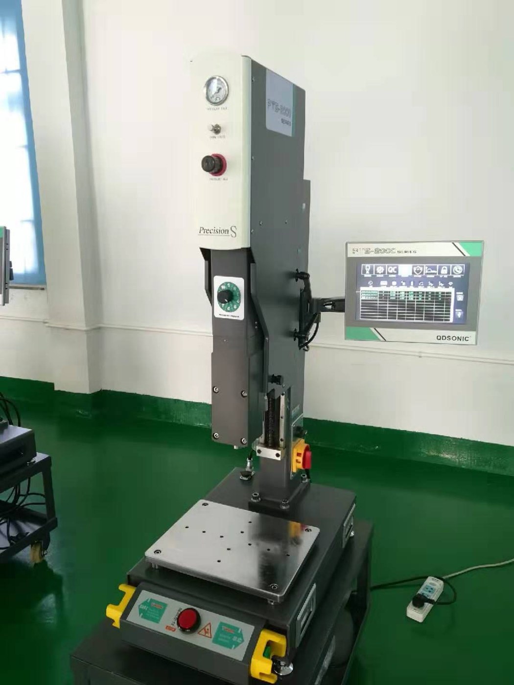 Rotary spin welding machine set up and run in the workshop before shipping